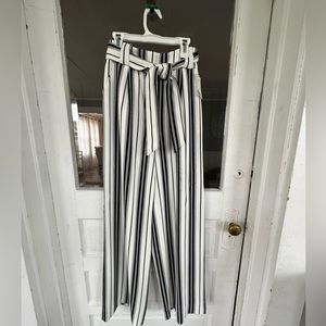 Navy and white striped flare pants with tie belt